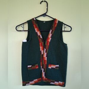 Green and patterned trim wool vest
